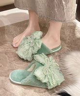 Bequeme Hausschuhe aus Kunstpelz mit rosa Schleife und Nagelperle